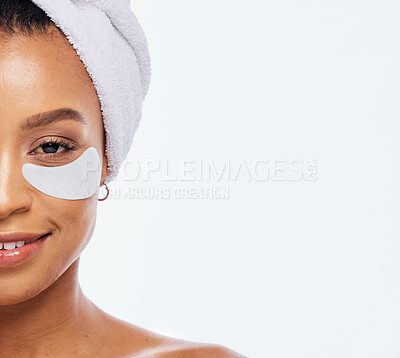 Buy stock photo Skin care, eye patch and beauty of a woman portrait with space in studio for dermatology. Aesthetic model for spa facial, towel and healthy or natural face glow cosmetics isolated on white background