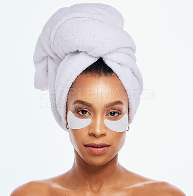 Buy stock photo Beauty patch, eye skincare and woman portrait in studio for natural dermatology. Aesthetic model for spa facial, towel and healthy or clean face glow cosmetic product isolated on a white background
