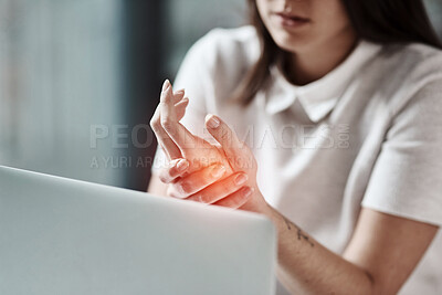 Buy stock photo Laptop, pain in hand and woman in office with wrist injury from writing, typing and working on computer. Stress, medical care and girl worker touch hands with carpal tunnel, muscle ache and arthritis