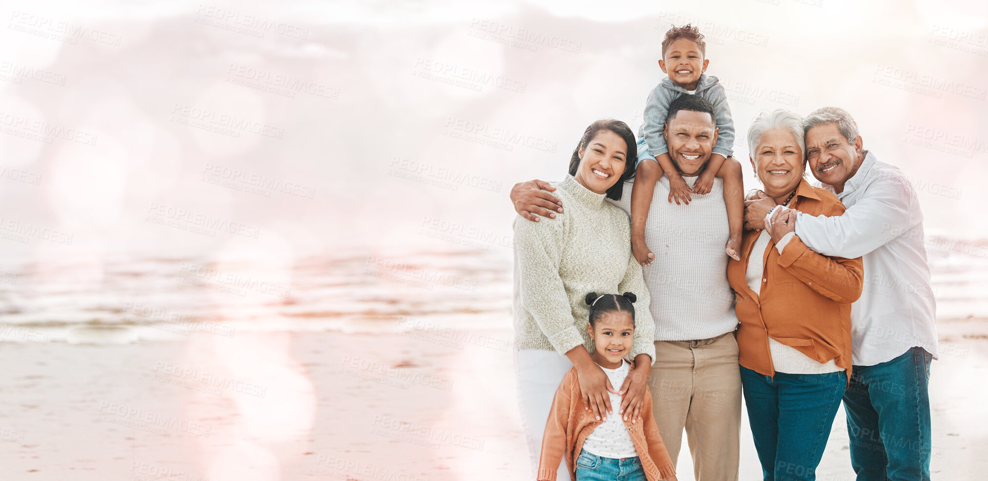 Buy stock photo Family portrait, hug and smile at the beach on mockup in joy for holiday break or vacation together. Happy parents, grandparents and kids smiling in joyful happiness for summer time by a ocean coast