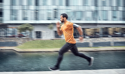 Buy stock photo Blurred, fitness and man running as exercise in the city training, workout and workout outdoors in a town. Athlete, runner and fit male sprint fast for wellness, cardio and health lifestyle
