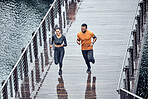 Top view, run or couple training, seaside or workout for wellness, healthy lifestyle or practice together. Running, black man or woman with exercise, promenade or performance with endurance or energy