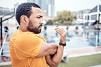Exercise, black man and stretching outdoor, focus and workout for wellness, endurance or healthy lifestyle. African American male, runner or athlete stretch arms warm up or start training for fitness