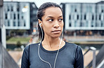 Music, fitness and face of black woman in city for wellness, healthy body and cardio workout in urban town. Sports, thinking and girl listening to audio for exercise, running and marathon training