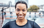 Portrait, happy and fitness with a sports black woman outdoor for a running, cardio or endurance workout. Face, smile and exercise with a female athlete training outside for health or vitality