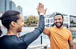 Couple of friends, laughing and high five for sports, success and team support in city. Happy athletes, fitness motivation and celebration of achievement, wellness and smile of winning exercise goals