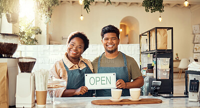 Buy stock photo Portrait, couple and open sign by restaurant owners happy at coffee shop or cafe in support together. Partnership, collaboration and team smiling due to startup growth and proud of success or vision