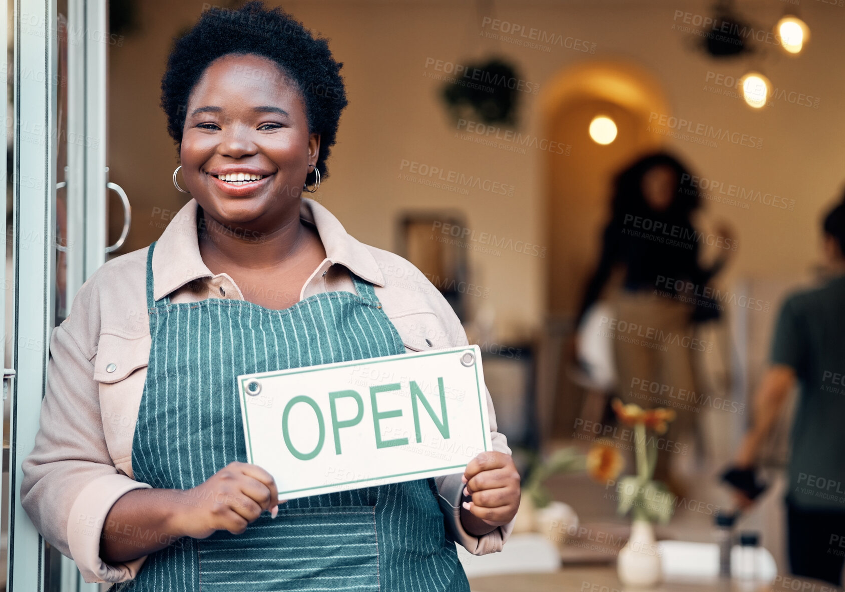 Buy stock photo Open sign, portrait and black woman in small business startup for shopping, customer service and retail success. Boss, manager or person hand holding board for welcome in new store with smile at door