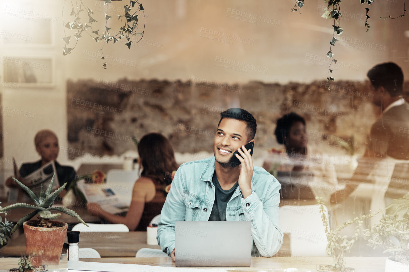 Buy stock photo Coffee shop, phone call and business man through cafe window sitting with laptop talking. Mobile communication, internet employee and computer work of a young professional in a restaurant talking