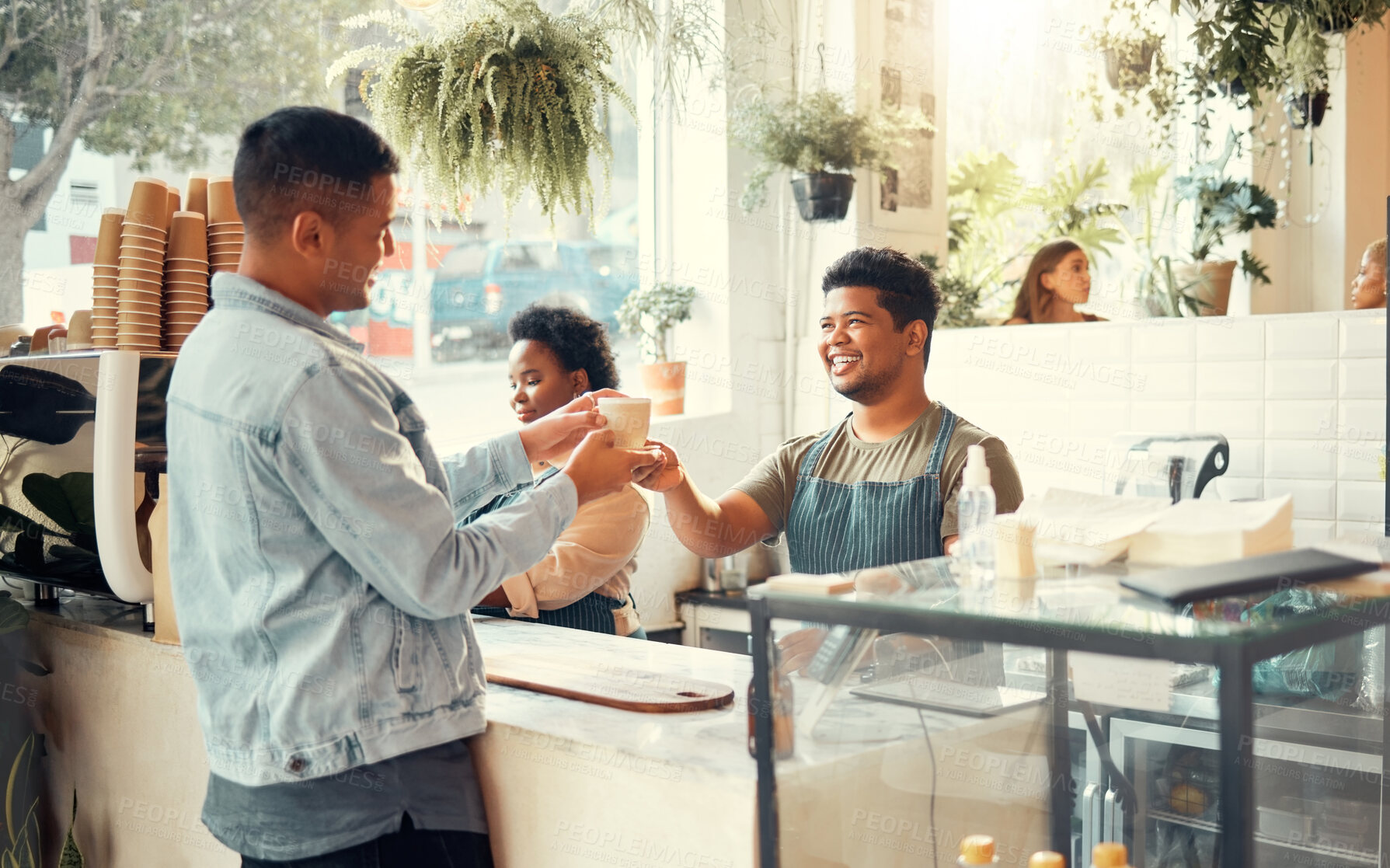 Buy stock photo Barista, coffee shop and service worker in the morning with customer in a restaurant. Happy employee, waiter and store worker with black man server and latte or espresso order in a retail business