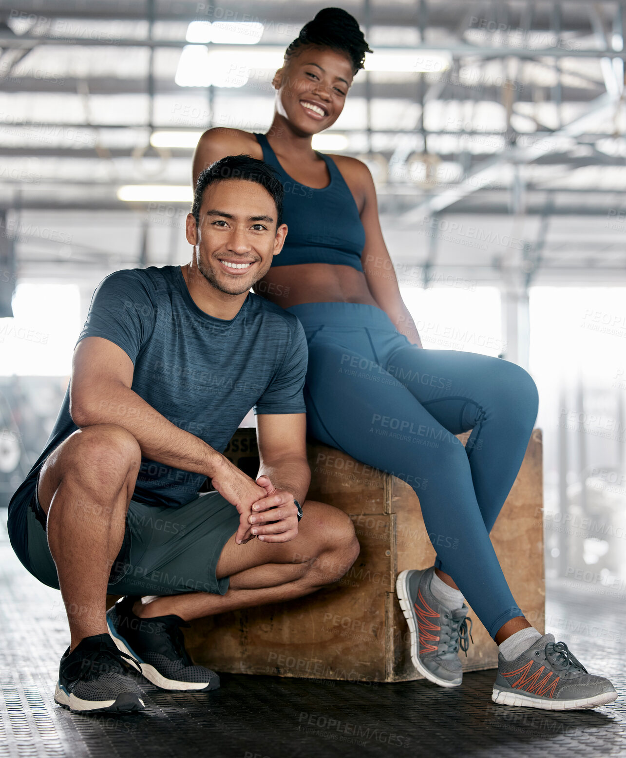 Buy stock photo Fitness, portrait or personal trainer with a happy client at gym for training, exercise or body workout. Team partnership, Indian coach or black woman smiles with pride together in a health club