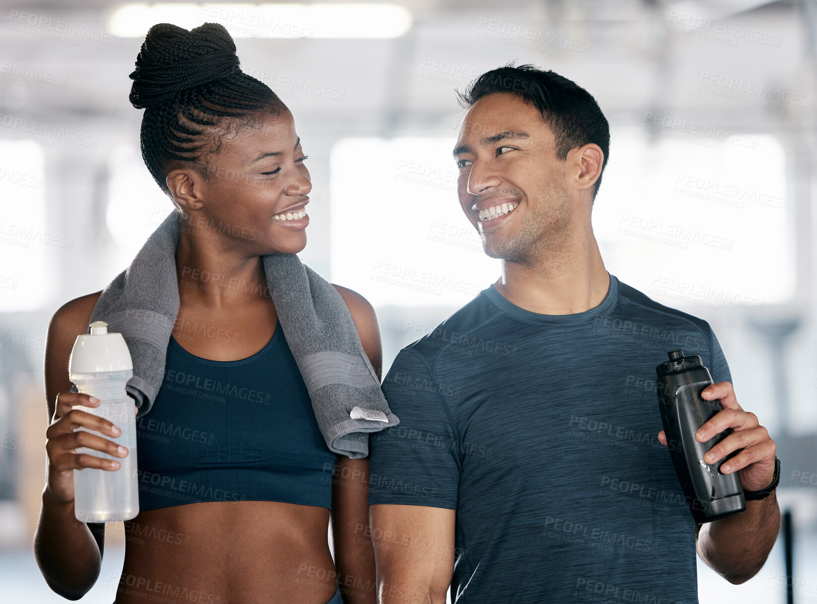 Buy stock photo Fitness, black woman or personal trainer drinking water in training, workout or exercise on relaxing break. Coaching, partnership or sports athletes with healthy liquid for hydration or energy at gym