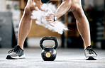 Fitness, start or hands with a kettlebell for training, workout or exercise with chalk or powder for grip. Body builder, mindset or healthy athlete with a heavy weight, motivation or focus at gym