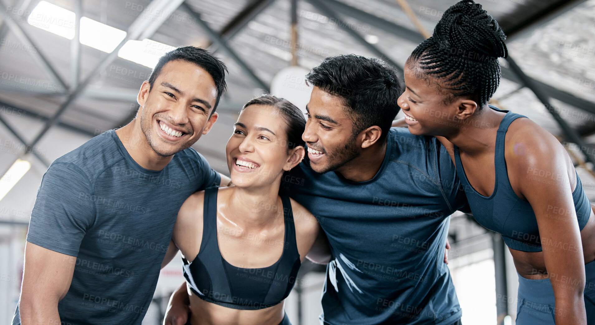 Buy stock photo Diversity, fitness and team collaboration for exercise, workout or training together at a indoor gym. Happy diverse group of people with smile in sports teamwork, huddle or hug for healthy exercising