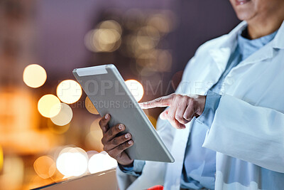 Buy stock photo Hands, tablet and healthcare with a doctor doing internet research outdoor on a hospital balcony at night. Medical, remote consulting and technology with a medicine professional outside at a clinic