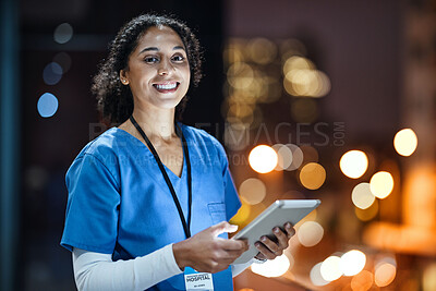 Buy stock photo Tablet, city and portrait of a woman doctor doing research at night on rooftop of hospital building. Medical, lights and female healthcare worker working late on mobile device on balcony of clinic.