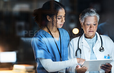 Buy stock photo Women, doctors and tablet for night medical research, surgery planning and teamwork in hospital. Nurse, healthcare and worker collaboration on technology in late shift for wellness thinking and ideas