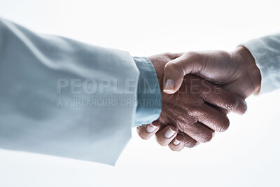 Buy stock photo Doctors, women and handshake on isolated white background for healthcare, wellness deal or teamwork collaboration. Zoom, medical and partnership gesture in hospital welcome, people trust or thank you