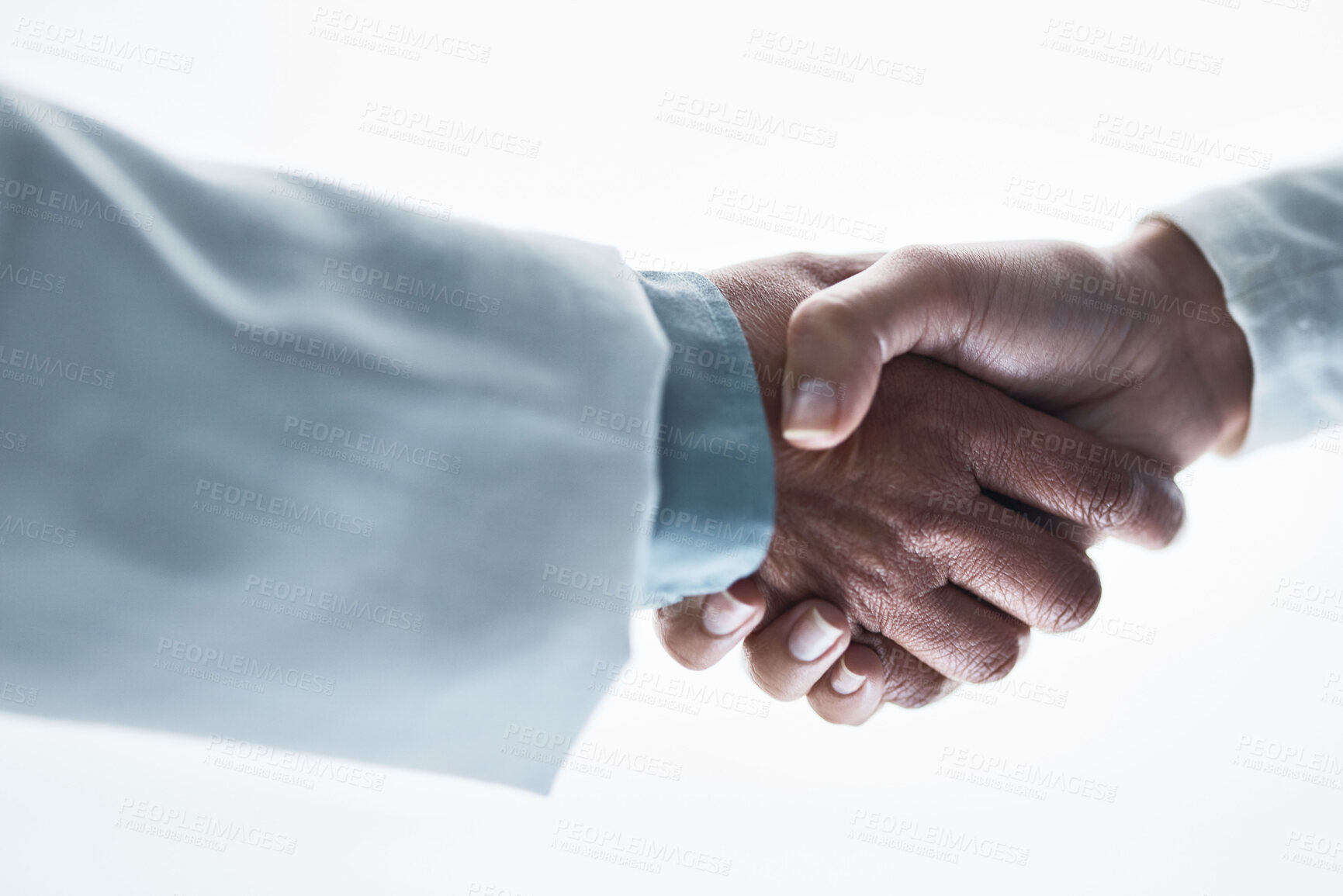 Buy stock photo Doctors, women and handshake on isolated white background for healthcare, wellness deal or teamwork collaboration. Zoom, medical and partnership gesture in hospital welcome, people trust or thank you