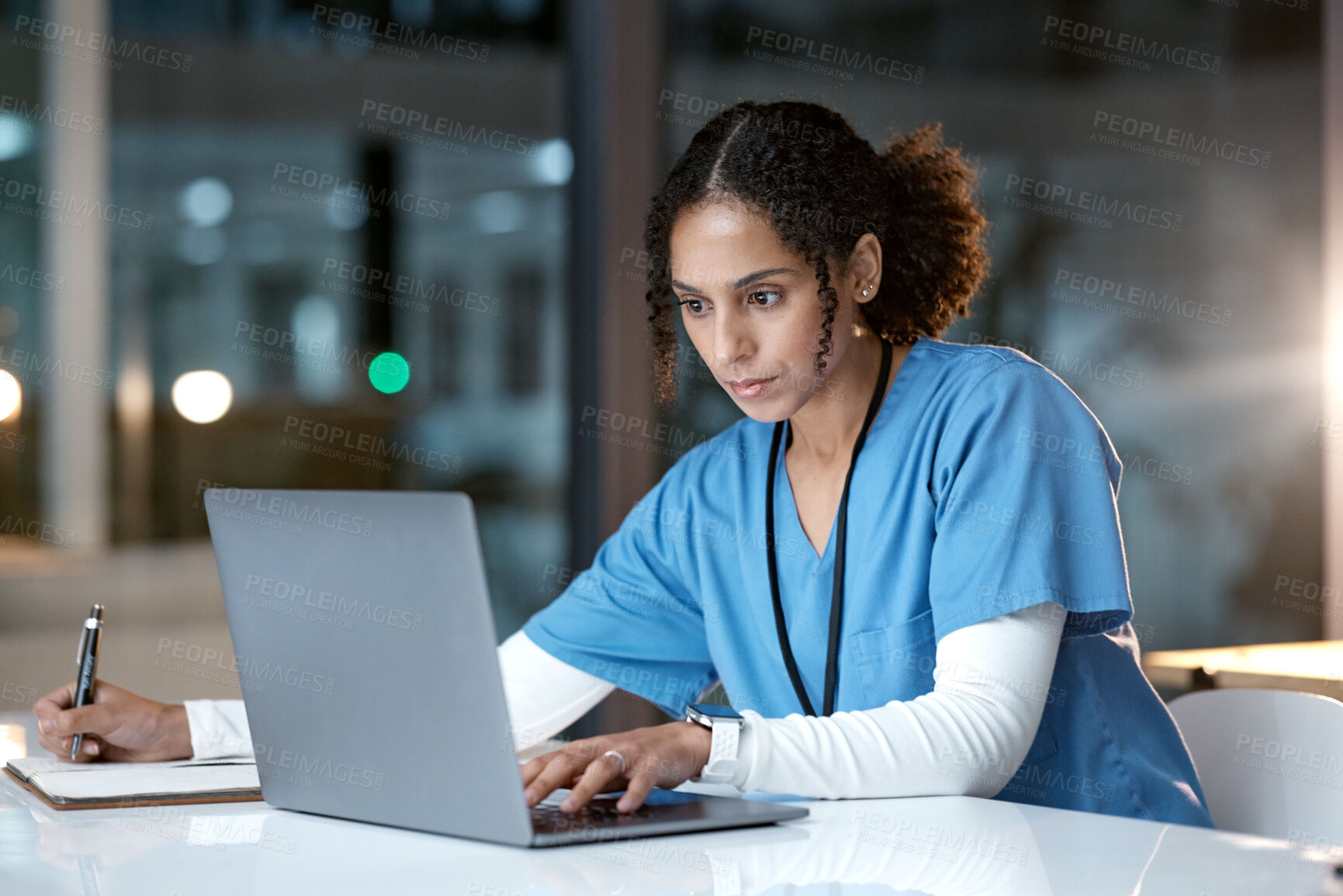 Buy stock photo Laptop, healthcare and doctor writing in notebook for medical research, planning and schedule in hospital. Telehealth, research and black woman with digital tech for online consultation in clinic