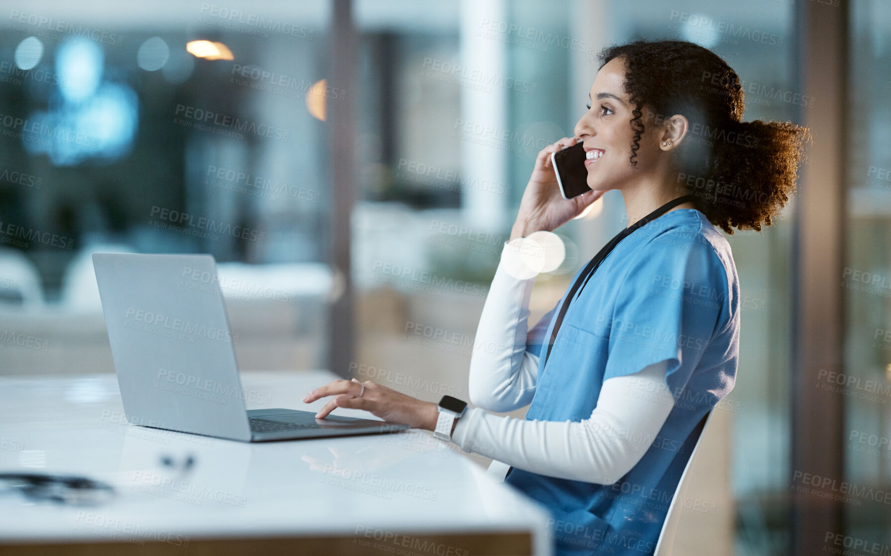 Buy stock photo Laptop, black woman and nurse on phone call in hospital, conversation and networking. Smartphone, night and happy female medical physician working late, telehealth or consulting for support in clinic