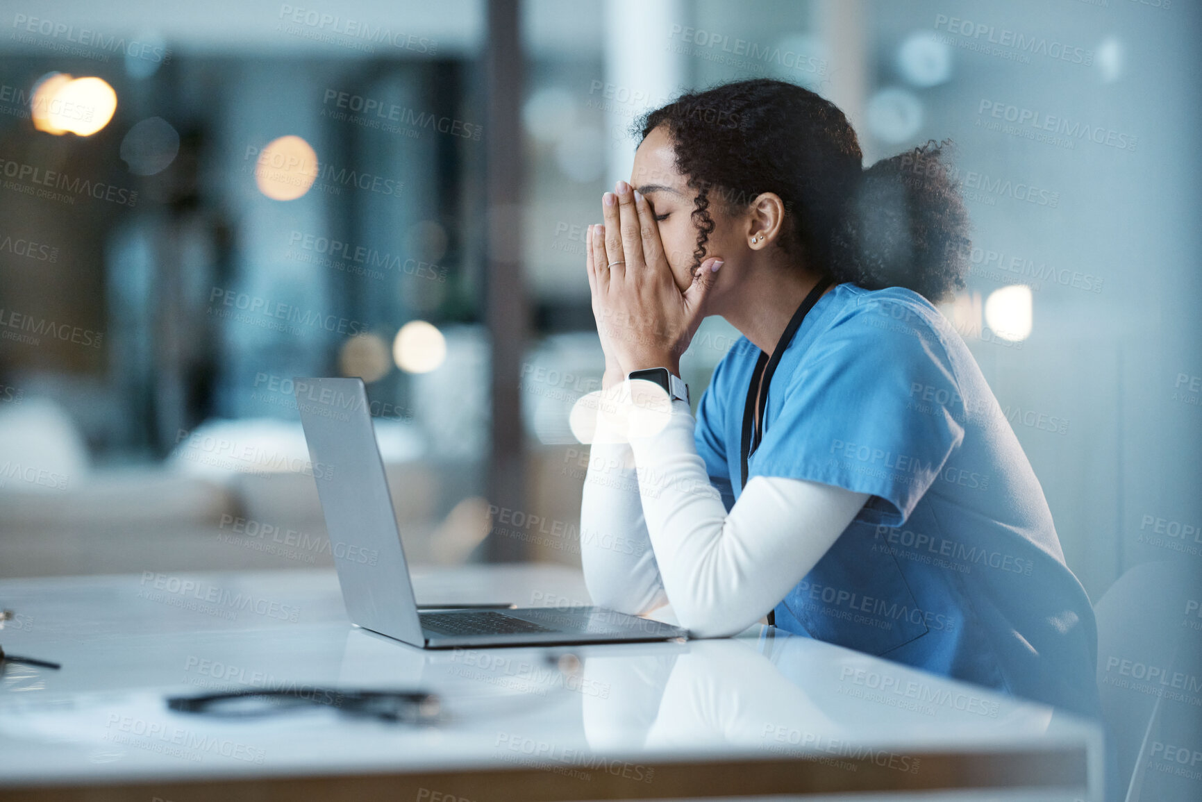 Buy stock photo Burnout stress, nurse and black woman in hospital feeling pain, tired or sick on night shift. Healthcare, wellness and female medical physician with depression or anxiety while working late on laptop