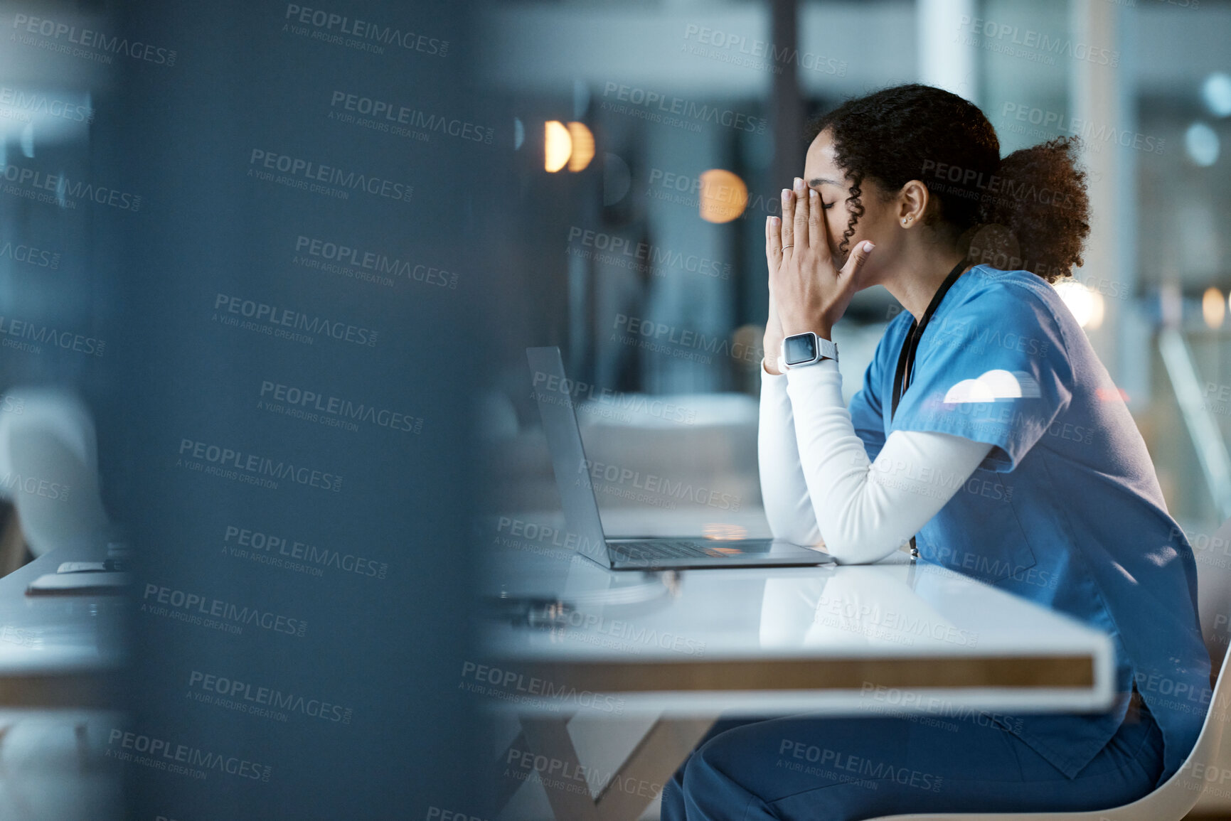 Buy stock photo Nurse, burnout stress and black woman in hospital feeling pain, tired or sick on night shift. Healthcare, wellness and female medical physician with depression or anxiety while working late on laptop