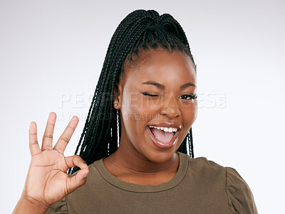 Buy stock photo Portrait, ok sign and black woman with smile, confident and achievement with girl on studio background. Face, African American female and happy lady with good news, celebration or success on backdrop