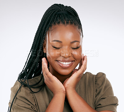 Buy stock photo Happy, calm and black woman smile with skincare, beauty and facial wellness in studio. White background, isolated and skin glow of relax african model with dermatology, cosmetics and face self care 