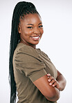 Happy, smile and portrait of a black woman in studio with a casual, stylish and fashion outfit. Happiness, excited and female model with braids standing with crossed arms isolated by white background