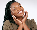 Happy, smile and black woman with skincare, beauty and facial wellness in a studio. White background, isolated and skin glow of young model with dermatology detox, cosmetics and face self care 