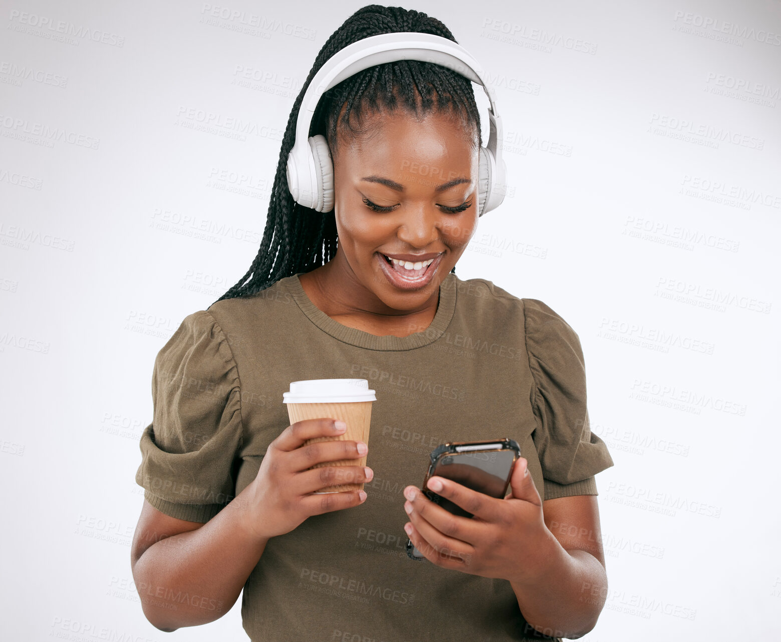 Buy stock photo Phone, music and coffee with a black woman in studio on a gray background listening to the radio. Mobile, social media or headphones and a young female streaming an audio playlist with a drink