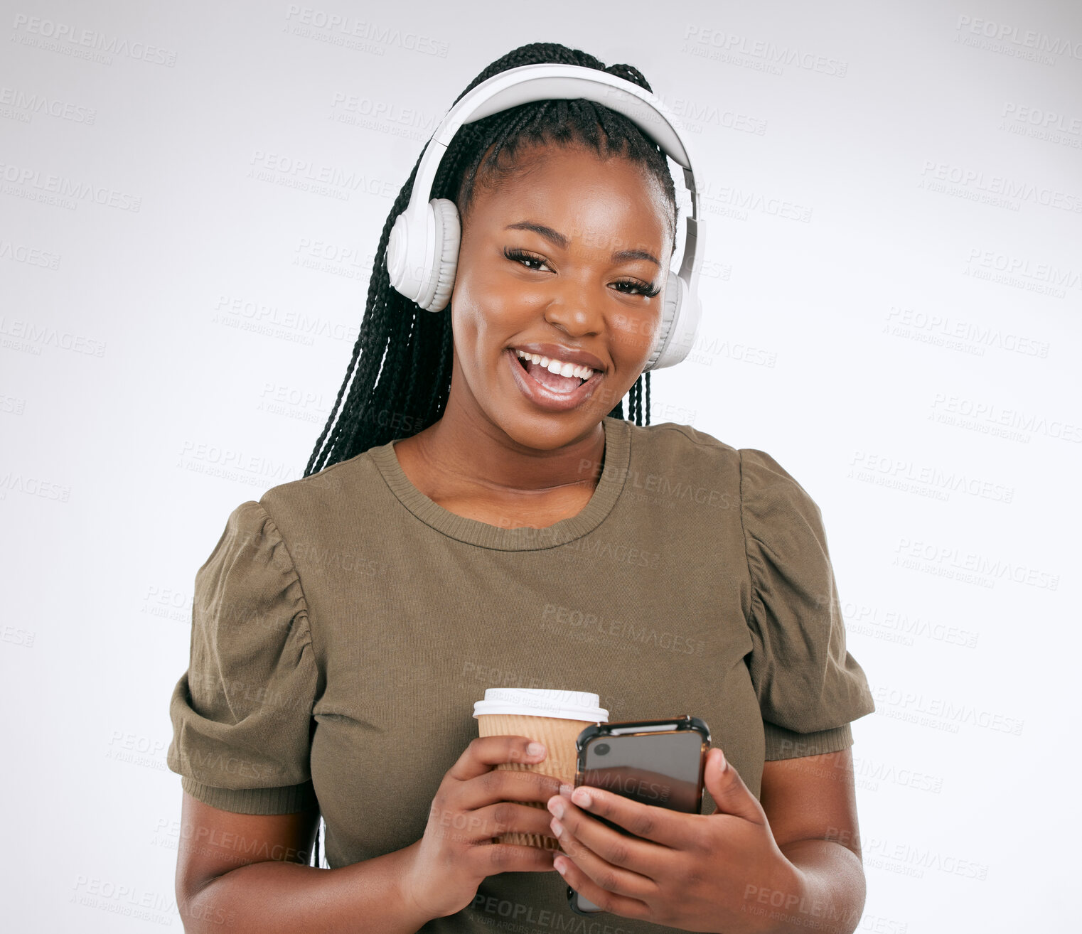 Buy stock photo Portrait, music and coffee with a black woman in studio on a gray background listening to the radio. Phone, social media or headphones and a young female streaming an audio playlist with a drink