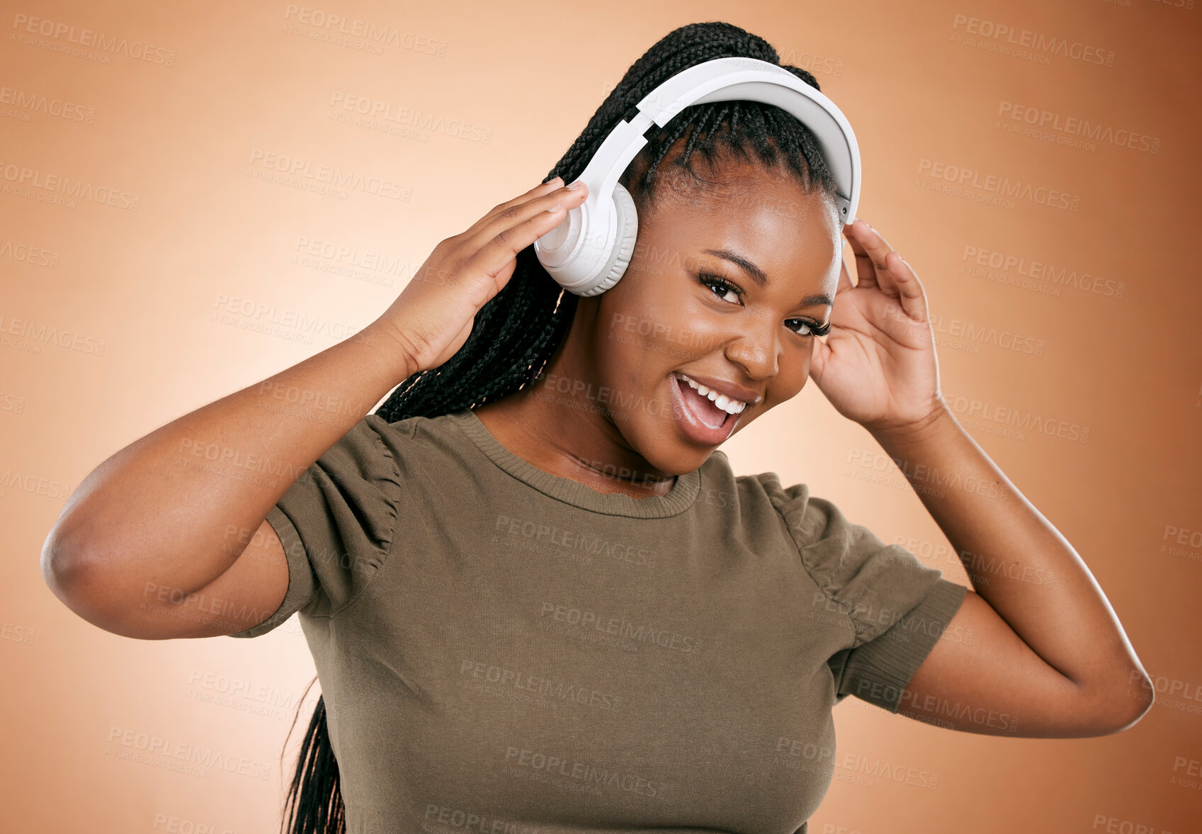 Buy stock photo Headphones, music and black woman in portrait isolated on studio background for mental health, energy and podcast. Happy african person listening to audio technology with smile on face for sound