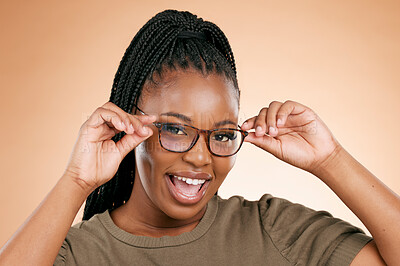 Buy stock photo Black woman, portrait and face with smart glasses for casual fashion or style against studio background. Happy gen z African American female with smile for eyewear, spectacles and sight or vision