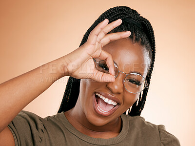 Buy stock photo Black woman, portrait smile and ok hand sign for perfect, great or right against studio background. Happy African American female smiling in happiness showing okay emoji gesture for positive attitude
