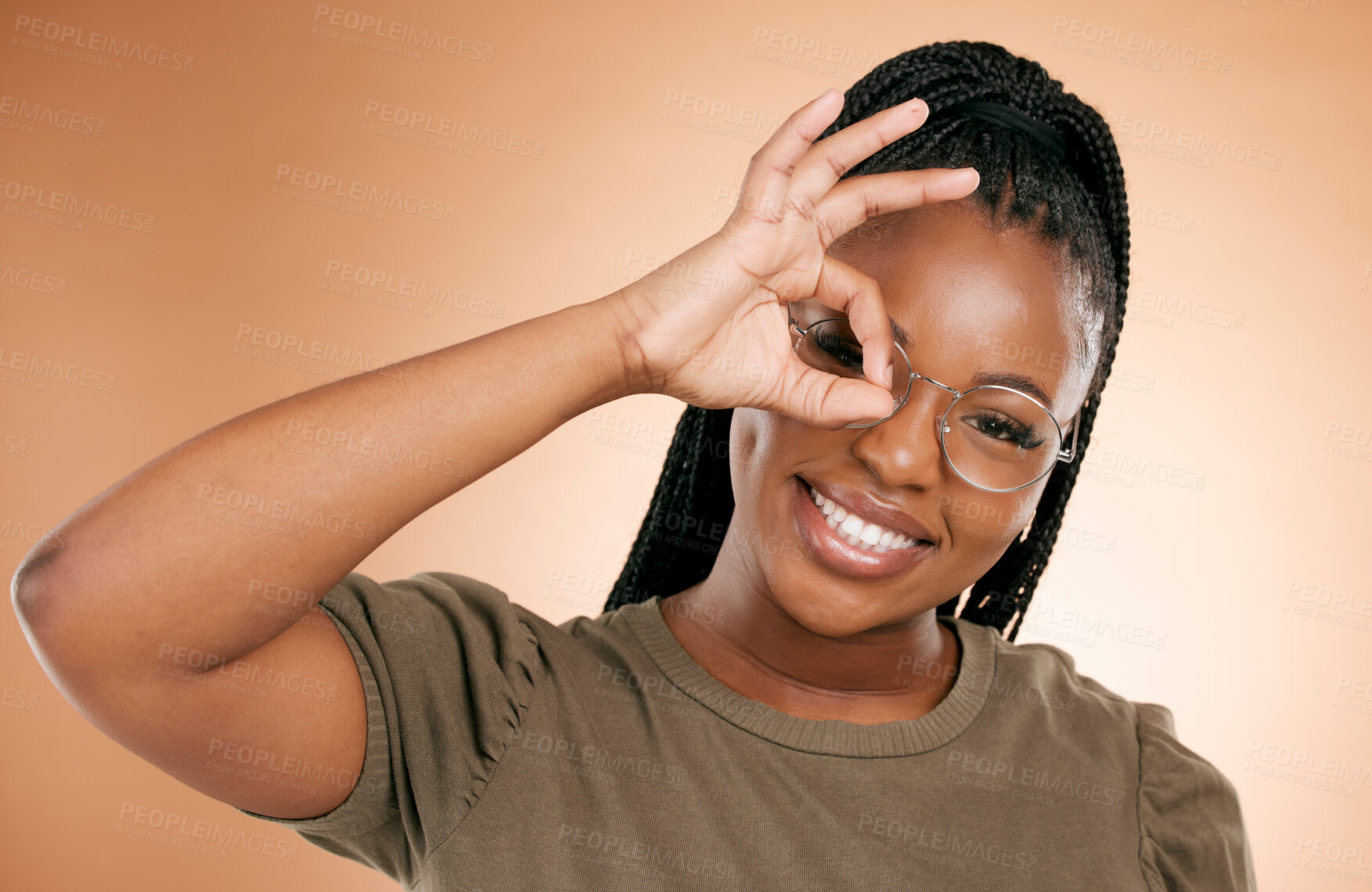 Buy stock photo Black woman, portrait smile and ok hand sign fro perfect, great or right against studio background. Happy African American female smiling in happiness showing okay emoji gesture for positive attitude