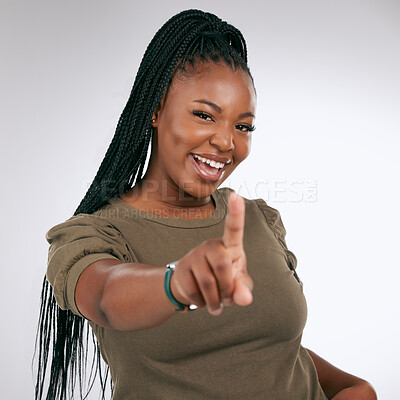 Buy stock photo Decision, smile and portrait of a pointing black woman isolated on a white background in a studio. Happy, young and face of an excited African model with a hand gesture for a choice on a backdrop