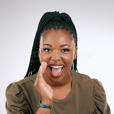 Buy stock photo Portrait, announcement and excited with a black woman in studio on a gray background to share news. Hands, promotion and information with a young female indoor sharing a secret as a brand ambassador