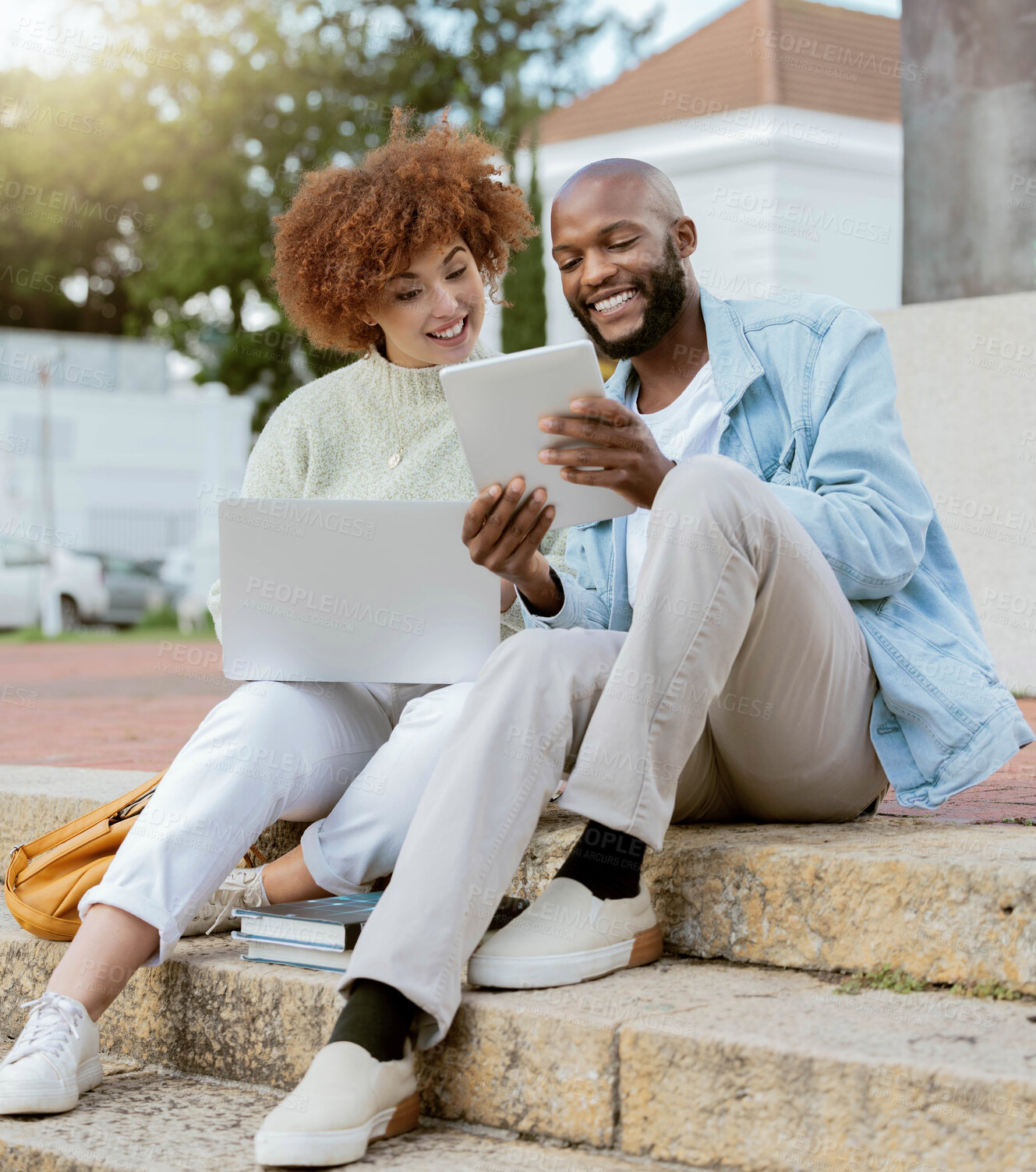 Buy stock photo Friends, technology and online on tablet and laptop, social media communication and young students outdoor. Black man, woman and smile, internet and 5g network with video or meme on college steps