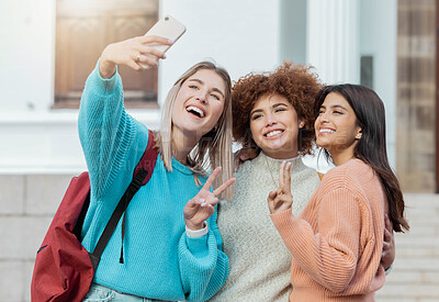 Buy stock photo Women group, peace selfie and students with hug at college campus for goals, diversity or social media. Gen z woman, happy photo and smartphone for embrace, smile and study at university for success