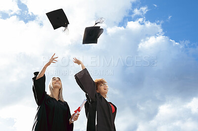Buy stock photo Graduate women, friends and cap in air for celebration, happiness or success for studying together at campus. University student, black woman and diversity for goal, vision and achievement at college