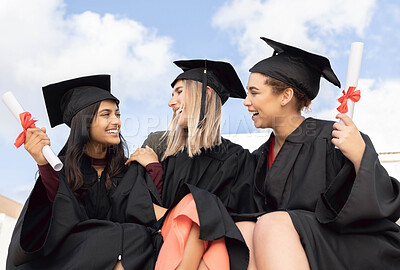 Buy stock photo Graduation, education and group of friends celebrate success on sky background. Happy women, diversity students and graduates in celebration of study goals, award and smile with college certificate 