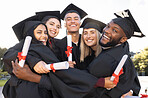 Graduation, group portrait and hug for celebration, success and education event outdoor. Diversity, students and excited graduates celebrate at happy campus, university goals and college dream award