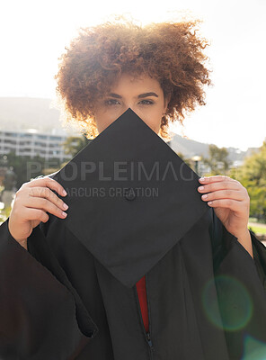 Buy stock photo University student girl, portrait and graduation cap to hide face with success, achievement and goal. Black woman, graduate celebration and vision in education, learning and future career in sunshine