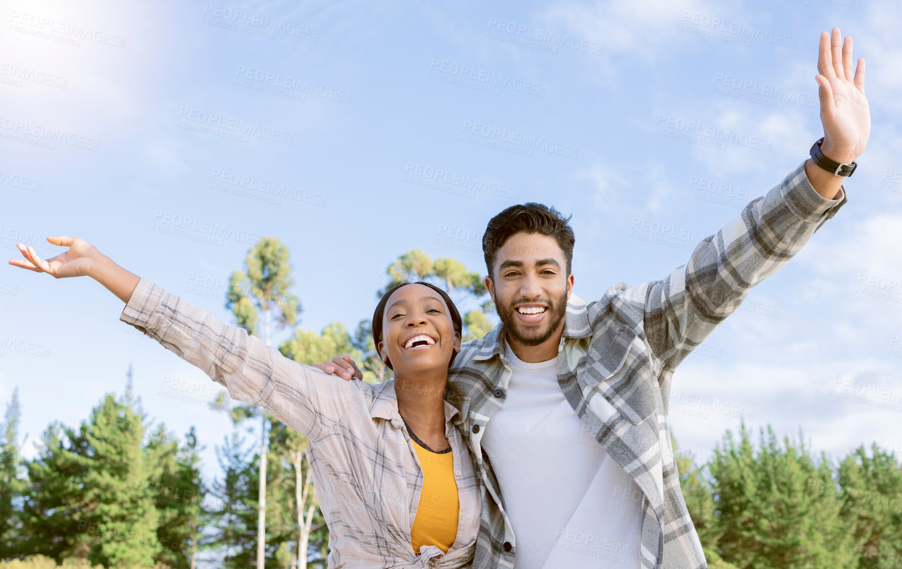 Buy stock photo Portrait, couple of friends and freedom of hiking in nature, forest and park. Diversity, man and woman celebrate journey, achievement and adventure on blue sky with motivation, smile and happiness 