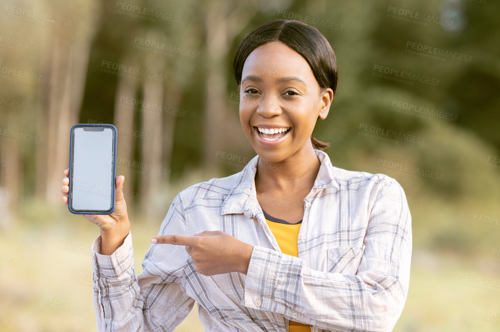 Buy stock photo Mockup phone screen, smile and portrait black woman pointing at marketing or advertising content. Outdoor, technology and person point with happiness and online on mobile with blurred background 