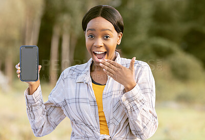 Buy stock photo Mockup, smartphone and black woman surprise in nature or park portrait for announcement or sale on mobile app. African person cellphone, mock up screen and wow on face for product placement in forest