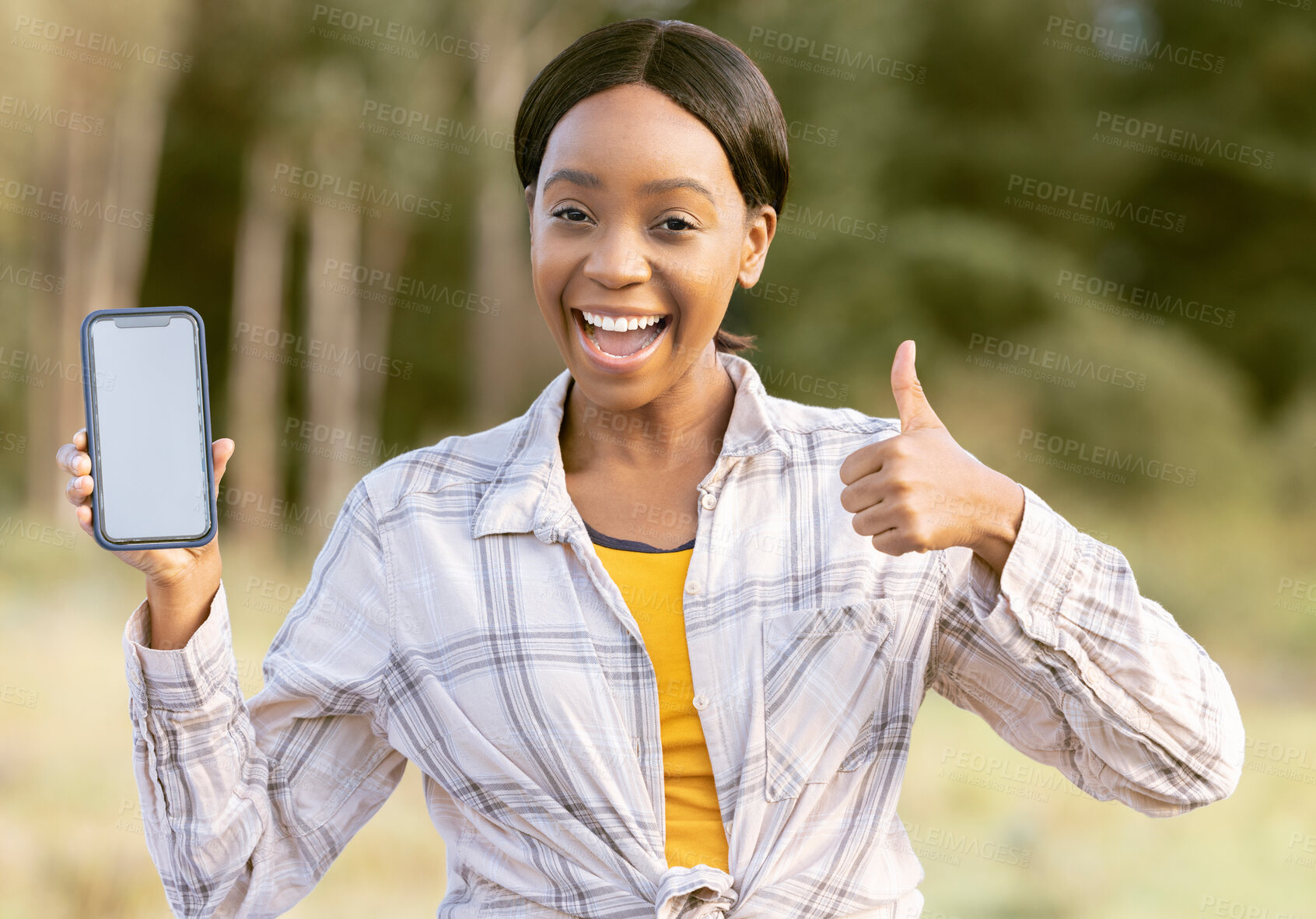 Buy stock photo Black woman, phone and thumbs up for winning on mockup display or screen for discount or sale in nature. Portrait of happy African American female smiling for giveaway prize, deal or 5G smartphone