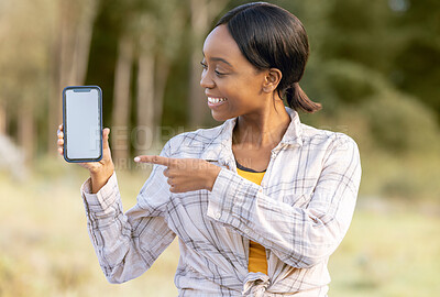 Buy stock photo Mockup screen, phone and black woman pointing at digital marketing, branding or advertising content. Outdoor, technology and person point with happiness and online on mobile with blurred background 